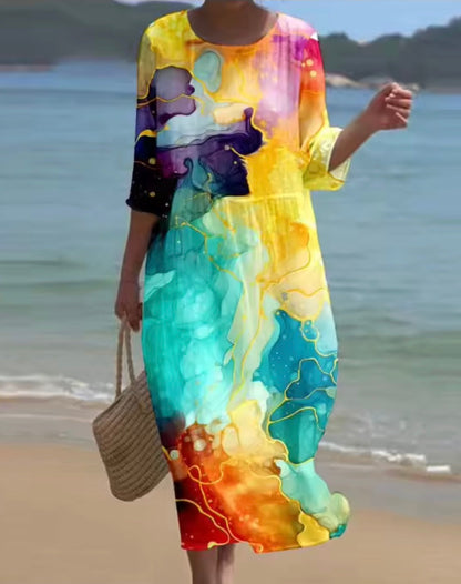 Women's floral print knee length dress with a round neck and short sleeves in blue and pink