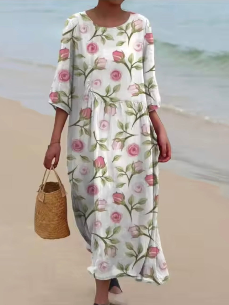 Women's floral print knee length dress with a round neck and short sleeves in blue and pink