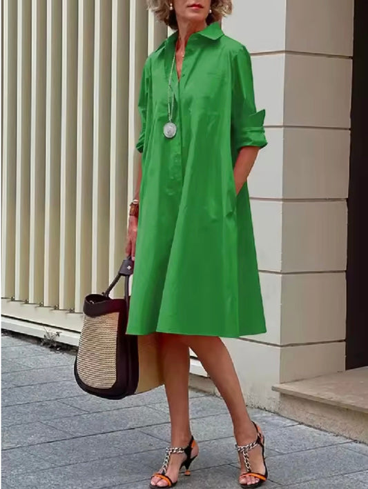 Women's collared A-line shirt dress with three-quarter sleeves and side pockets