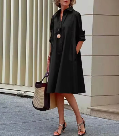 Women's collared A-line shirt dress with three-quarter sleeves and side pockets