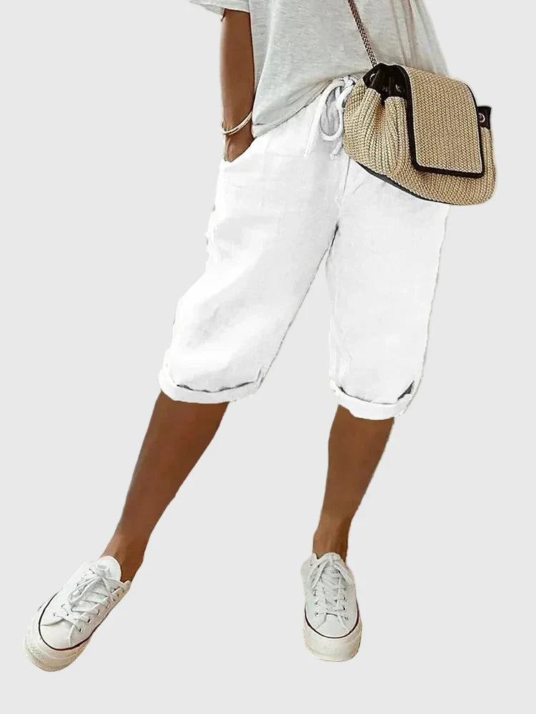 Women's soft cotton tailored comfort shorts in black, beige, green, blue and white, shown for womenswear styling