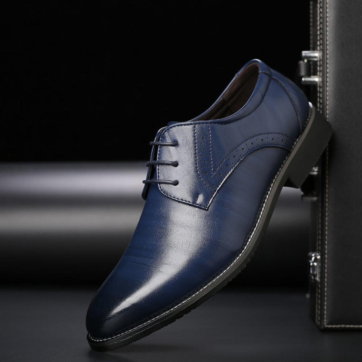 Kessoro Men's Classic Leather Lace-Up Brogue Dress Shoes in black, blue, brown and yellow — styled on model