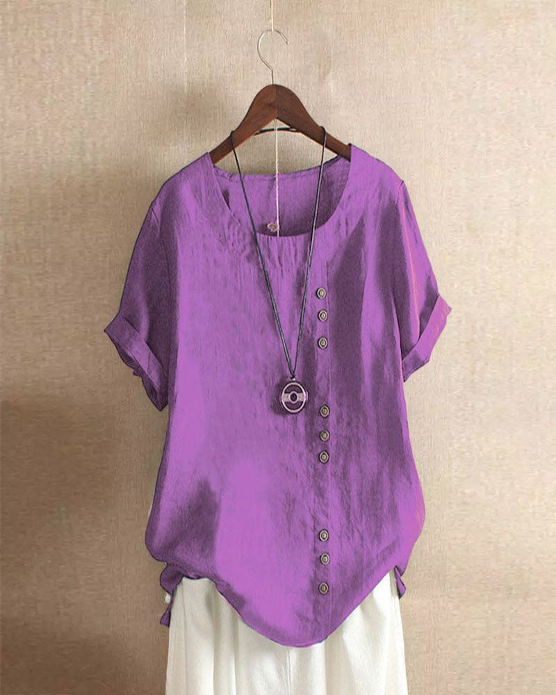 Women's asymmetrical button detail lightweight summer blouse in nine colourways, shown for womenswear styling