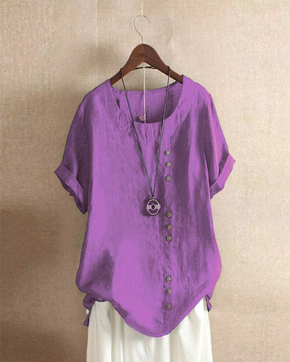 Women's asymmetrical button detail lightweight summer blouse in nine colourways, shown for womenswear styling