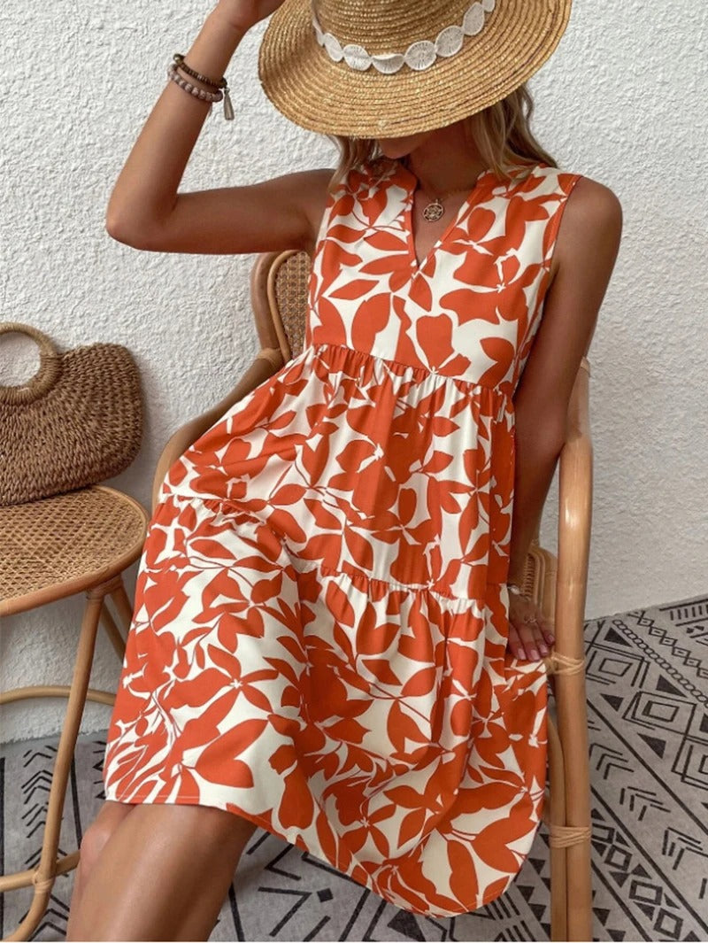 Women's boho floral short dress with a V neckline and fine straps in black, blue, green and orange