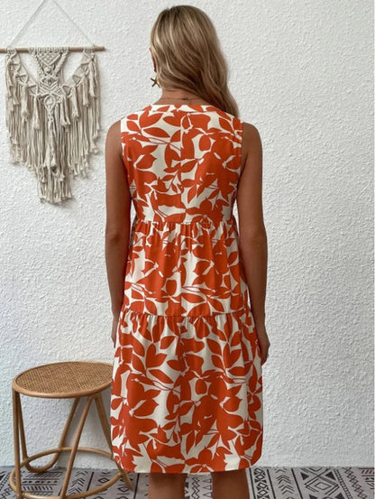 Women's boho floral short dress with a V neckline and fine straps in black, blue, green and orange