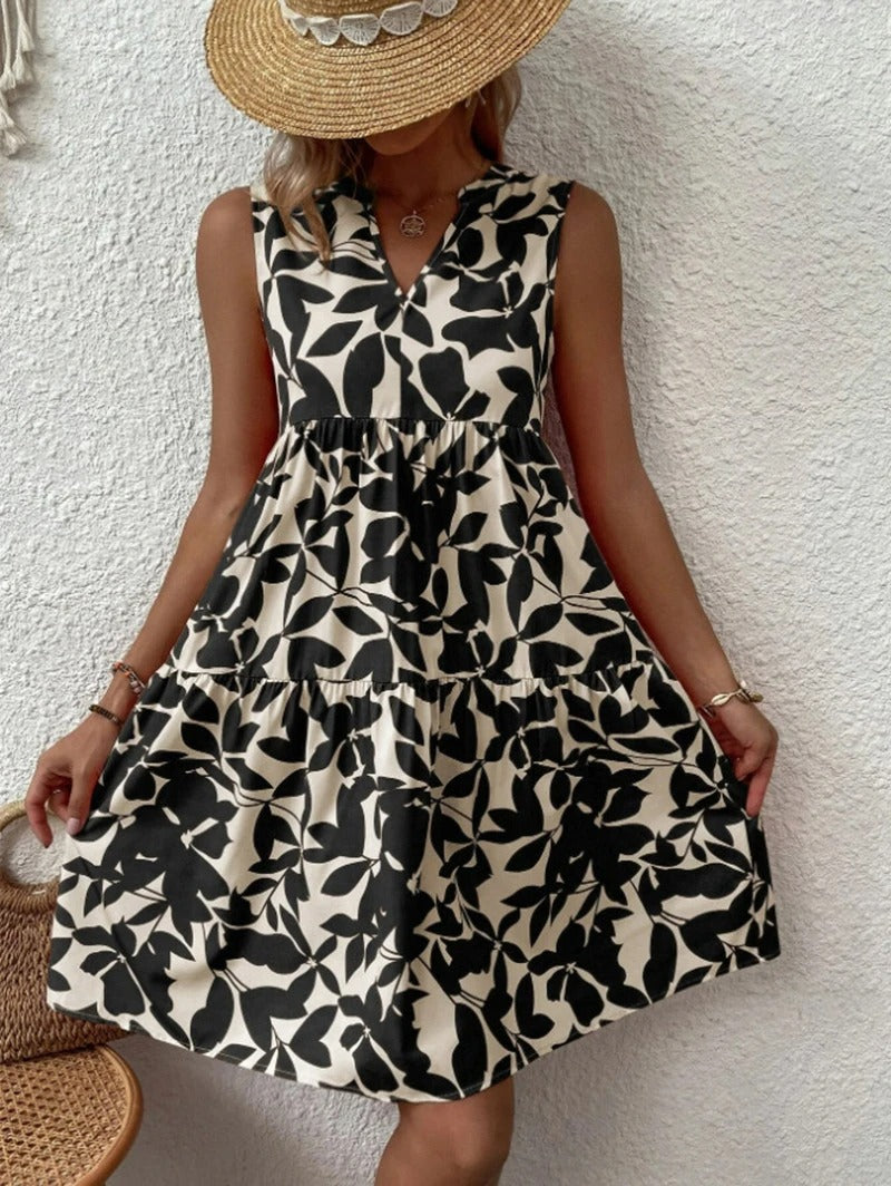 Women's boho floral short dress with a V neckline and fine straps in black, blue, green and orange
