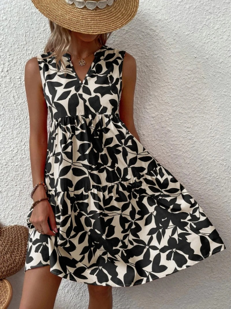Women's boho floral short dress with a V neckline and fine straps in black, blue, green and orange