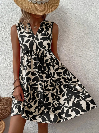 Women's boho floral short dress with a V neckline and fine straps in black, blue, green and orange