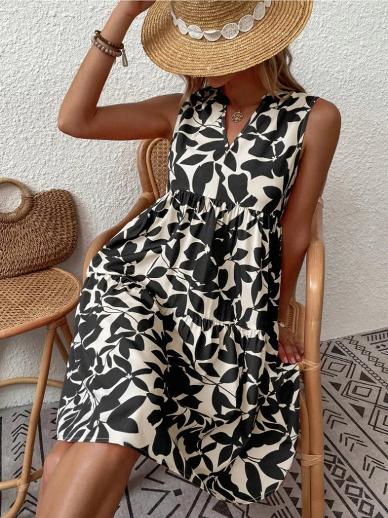 Women's boho floral short dress with a V neckline and fine straps in black, blue, green and orange