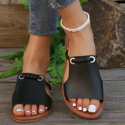 Women's braided strap slip-on sandal in brown, white and black vegan leather