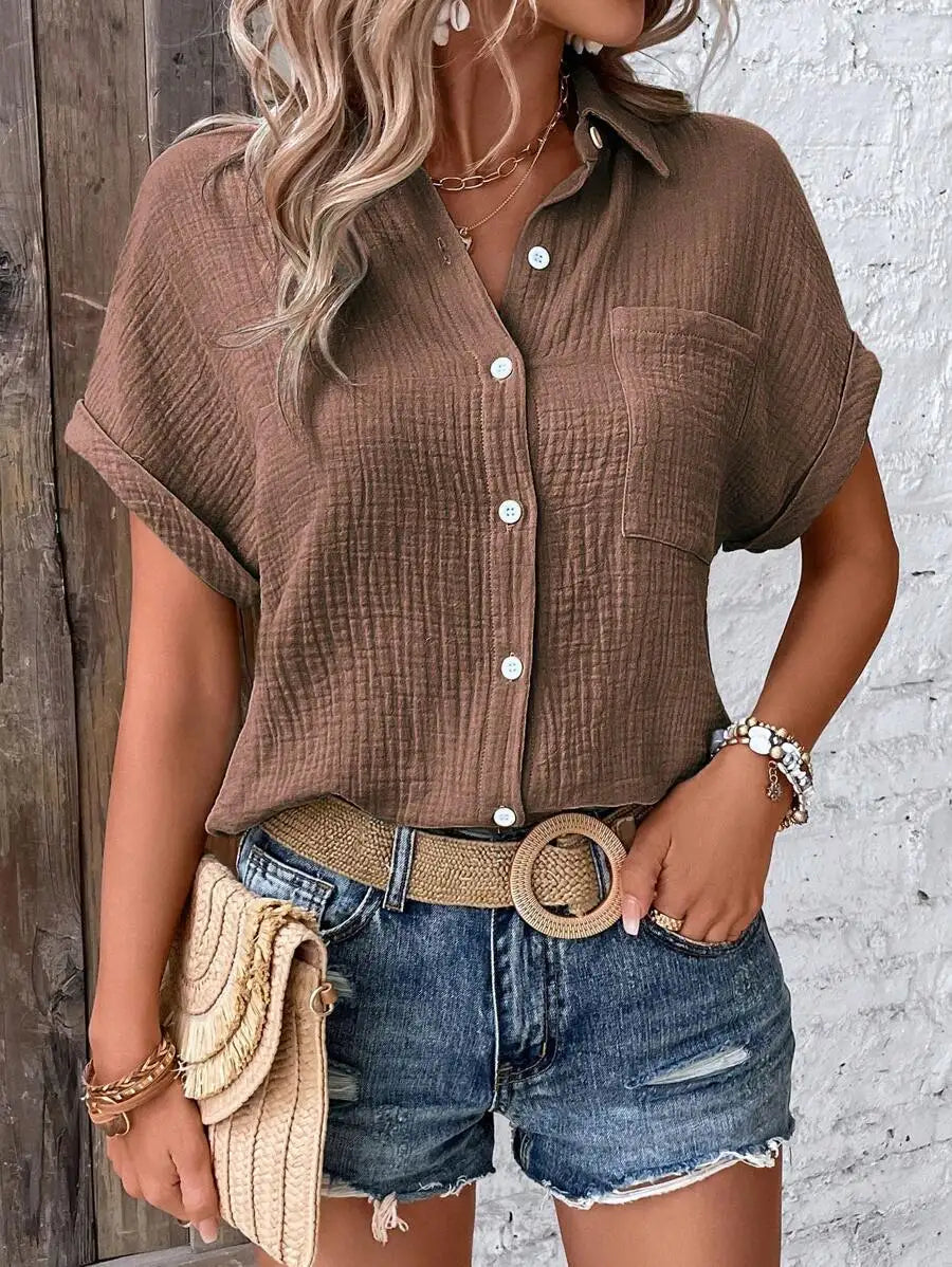 Women's short-sleeve cotton collared blouse, flat lay