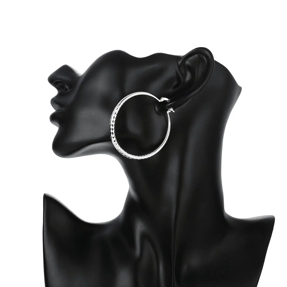 Kessoro women's retro silver tone long drop earrings with an elongated silhouette