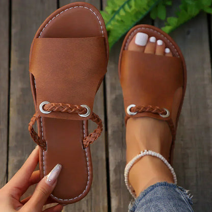 Women's braided strap slip-on sandal in brown, white and black vegan leather
