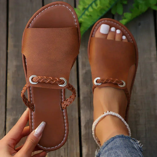 Women's braided strap slip-on sandal in brown, white and black vegan leather