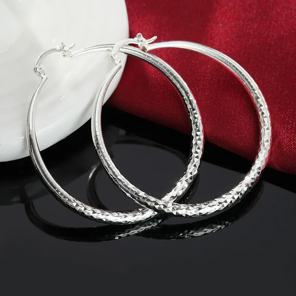 Kessoro women's retro silver tone long drop earrings with an elongated silhouette