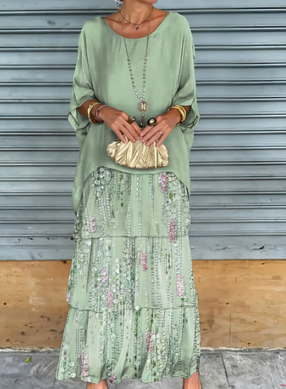 Women's flowing layered elegant maxi dress in a soft muted colourway
