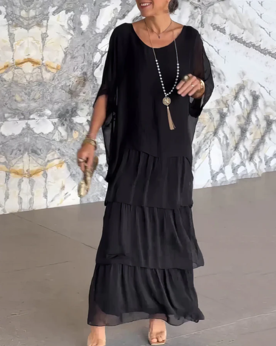 Women's flowing layered elegant maxi dress in a soft muted colourway