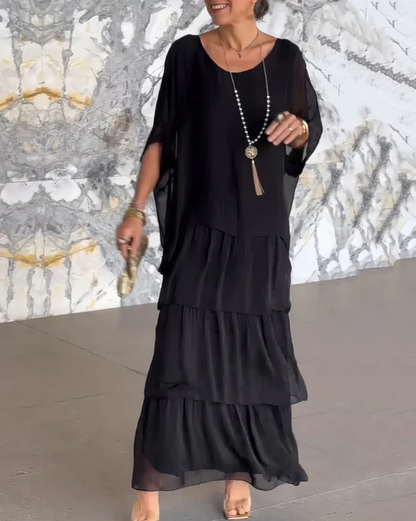 Women's flowing layered elegant maxi dress in a soft muted colourway