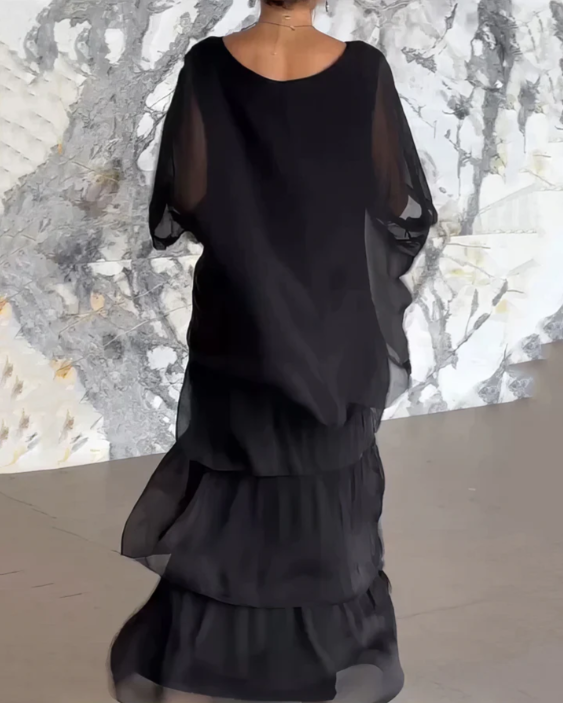 Women's flowing layered elegant maxi dress in a soft muted colourway