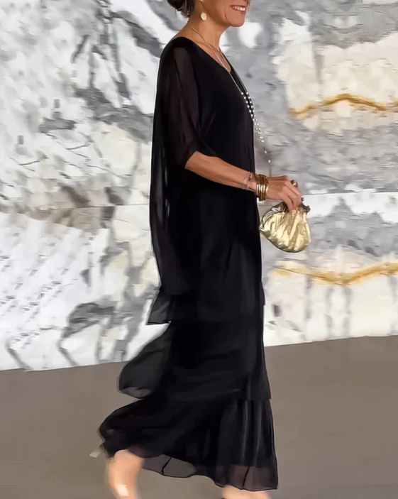 Women's flowing layered elegant maxi dress in a soft muted colourway