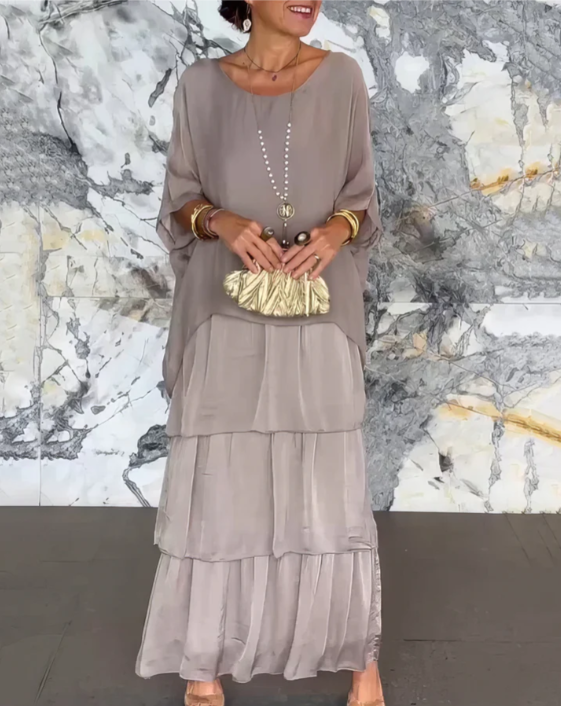 Women's flowing layered elegant maxi dress in a soft muted colourway