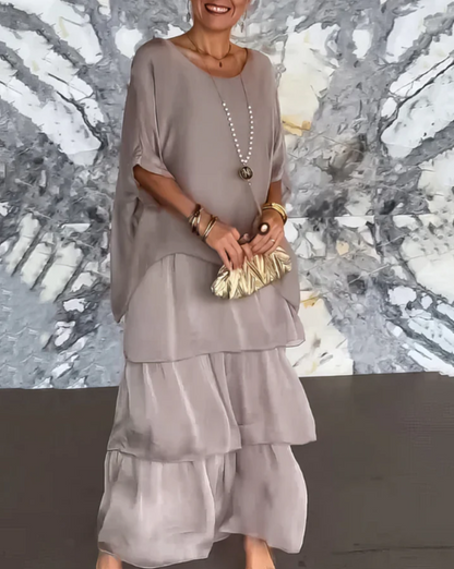 Women's flowing layered elegant maxi dress in a soft muted colourway