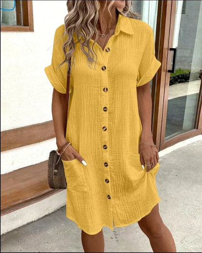Women's relaxed polo dress with a collar, button front and pockets in white, black, yellow and green