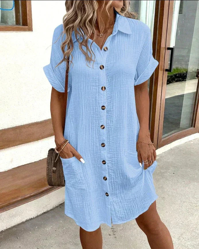 Women's relaxed polo dress with a collar, button front and pockets in white, black, yellow and green