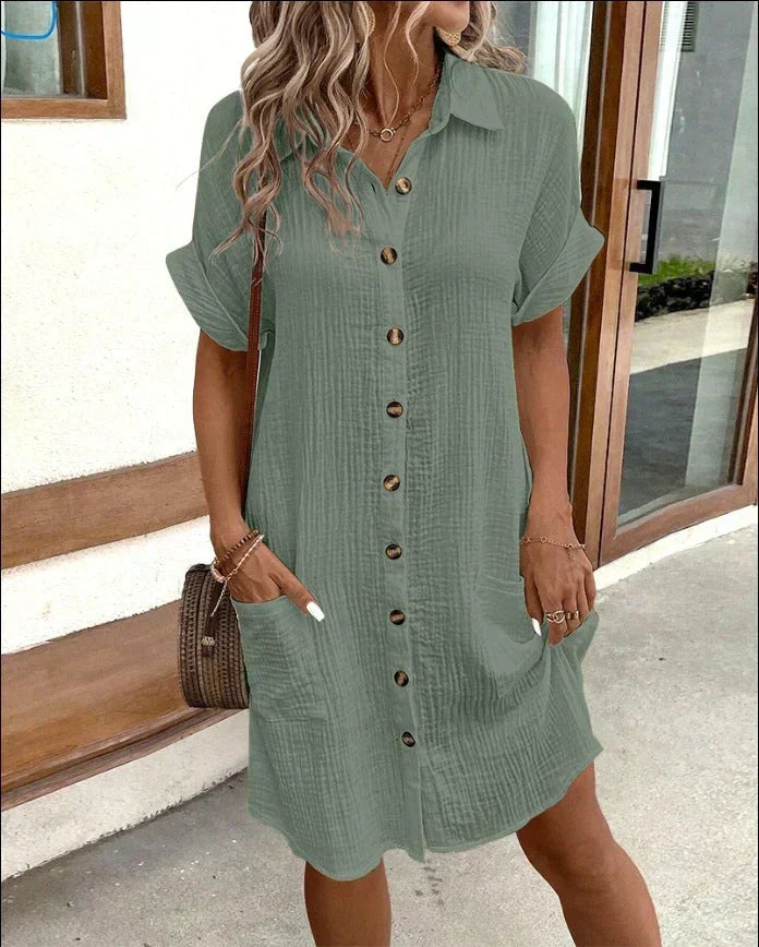 Women's relaxed polo dress with a collar, button front and pockets in white, black, yellow and green