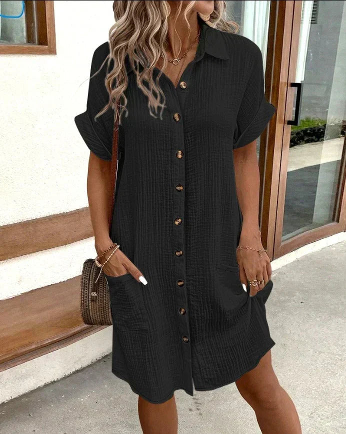 Women's relaxed polo dress with a collar, button front and pockets in white, black, yellow and green