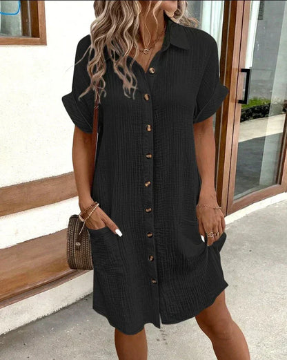 Women's relaxed polo dress with a collar, button front and pockets in white, black, yellow and green