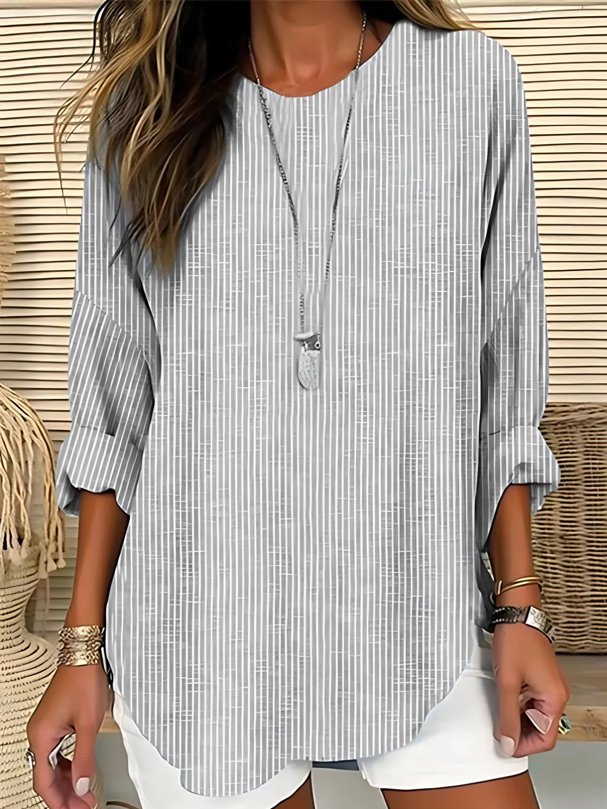 Women's striped relaxed drape blouse with a softly flowing silhouette