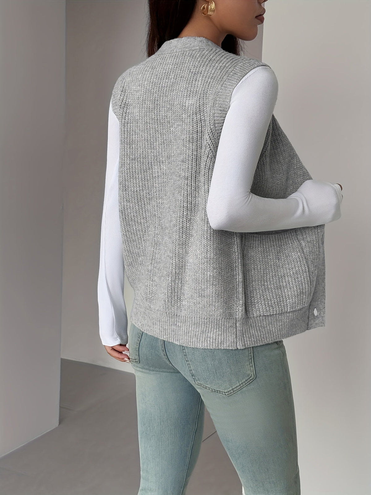 Kessoro women's buttoned V-neck knit vest with front pockets in soft neutral colourways