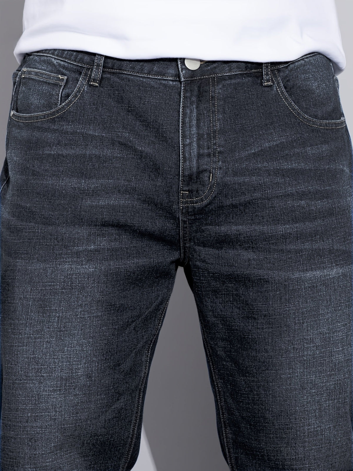 Men's mid-rise straight-leg stretch jeans in blue and black denim, colour option 2 side view
