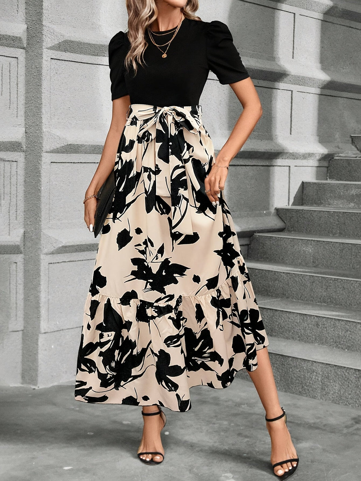 Kessoro women's printed tiered maxi dress shown in a green and black colourway on a female model