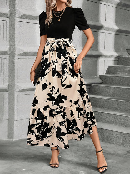 Kessoro women's printed tiered maxi dress shown in a green and black colourway on a female model