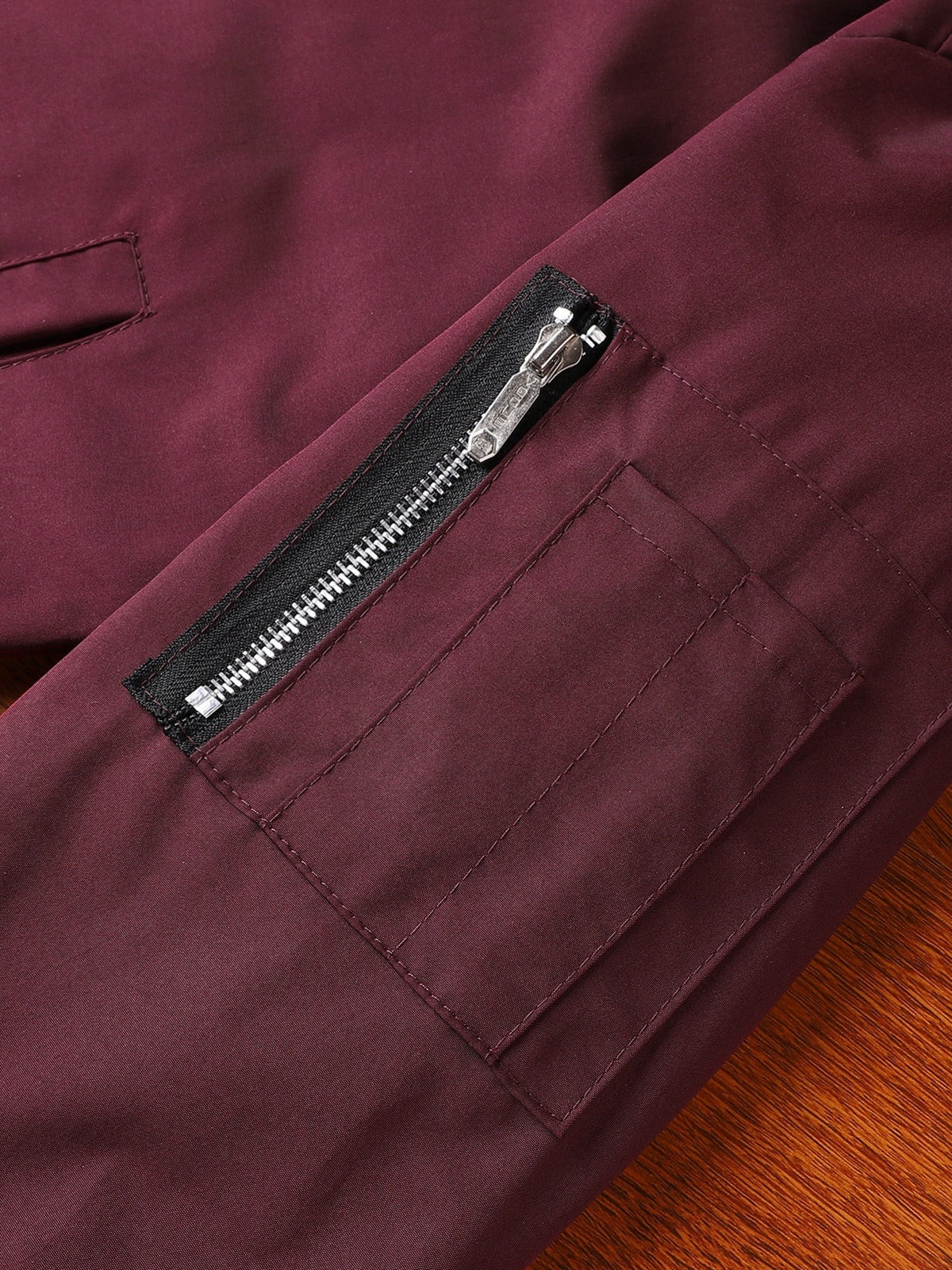 Men's classic zip-front everyday bomber jacket in black and burgundy, full-length view