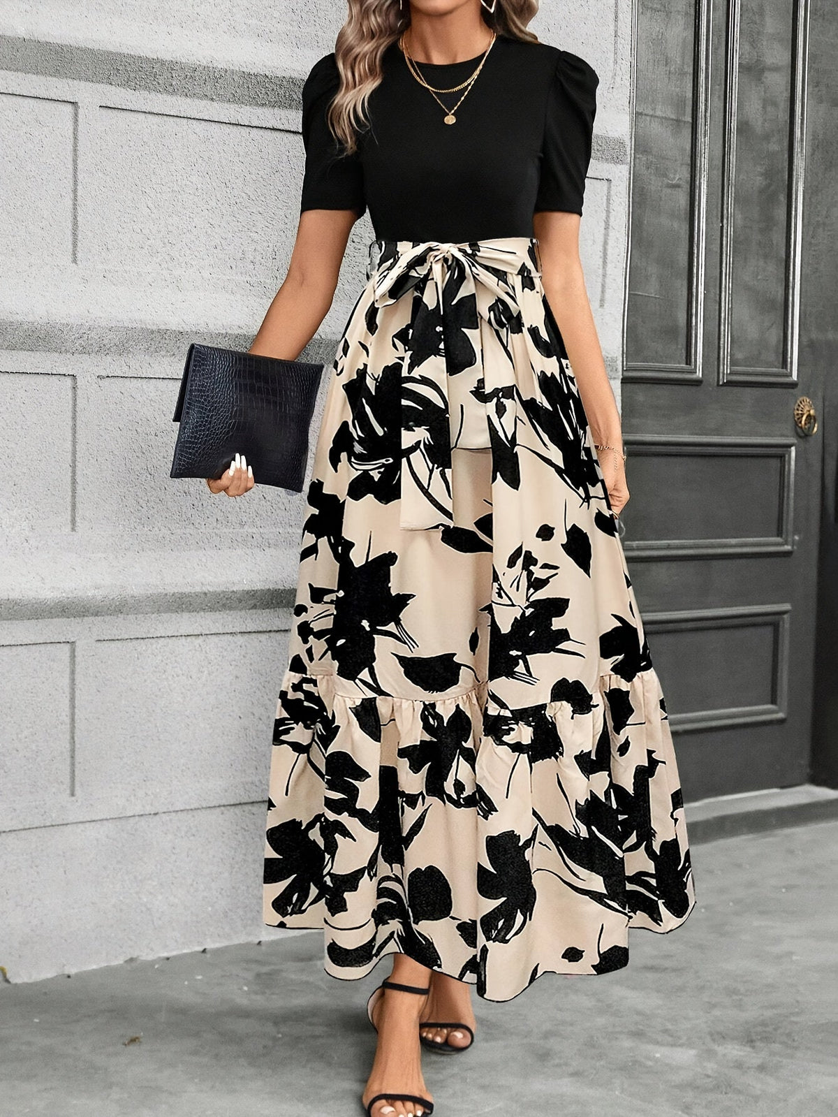 Kessoro women's printed tiered maxi dress shown in a green and black colourway on a female model