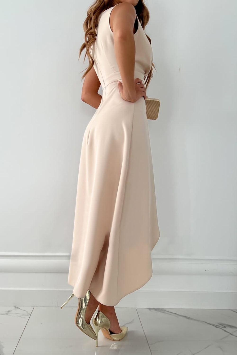 Women's sleeveless wrap V-neck maxi dress in beige, styled on a female model