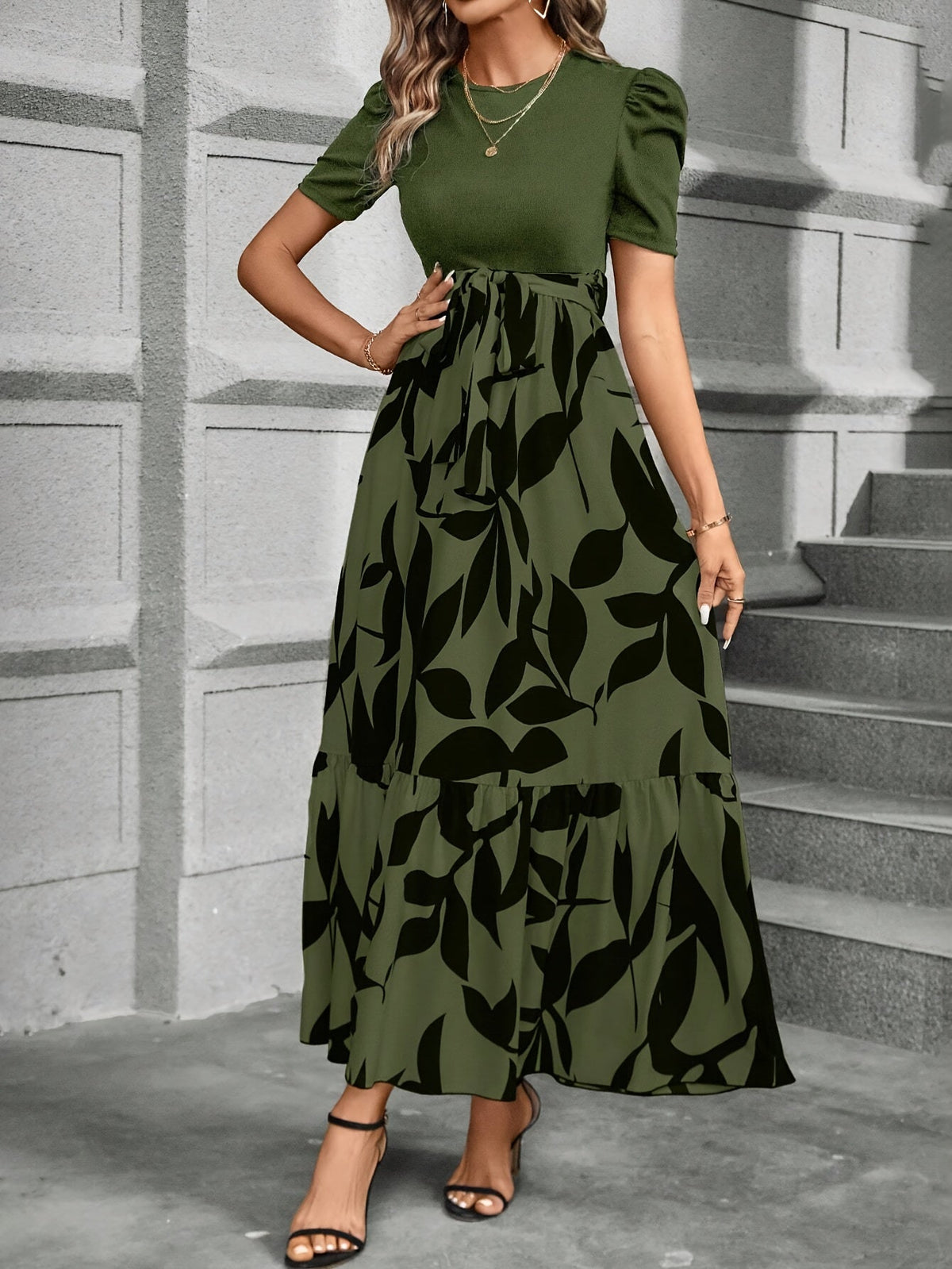 Kessoro women's printed tiered maxi dress shown in a green and black colourway on a female model