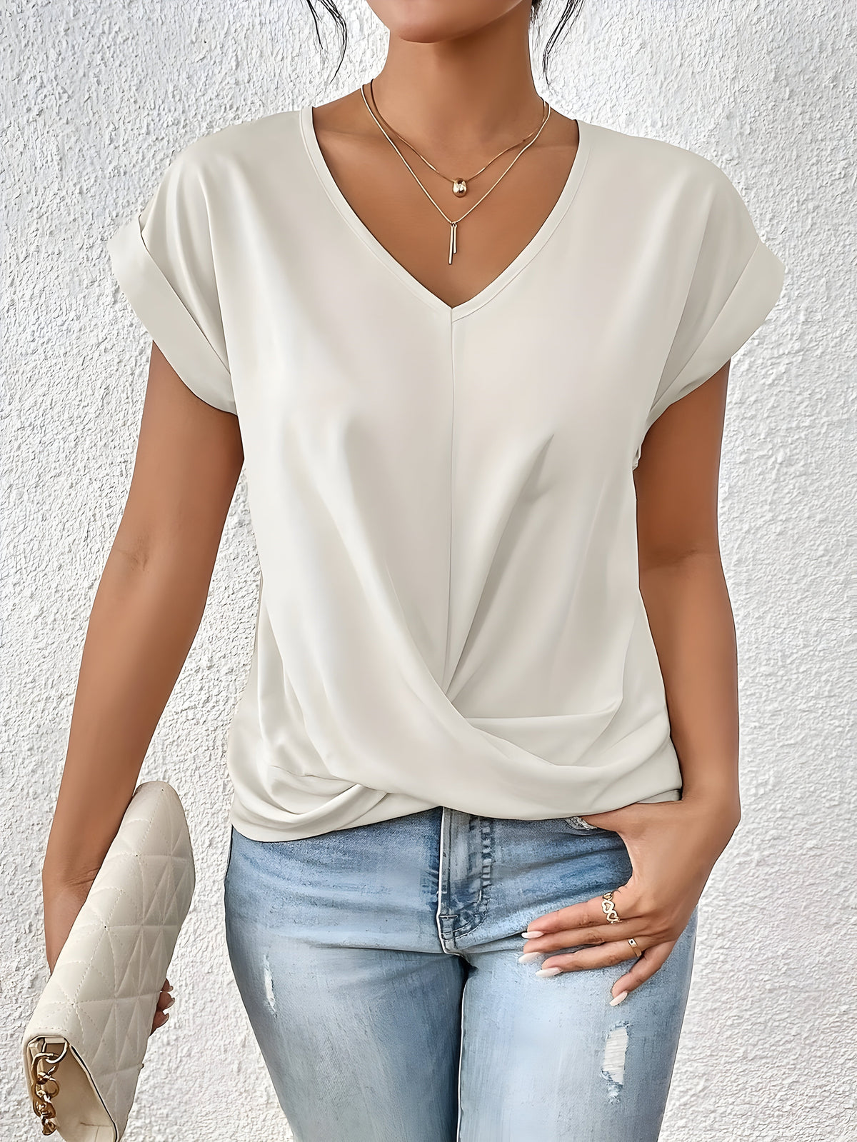 Women's twist-front V-neck top with waist-defining detail