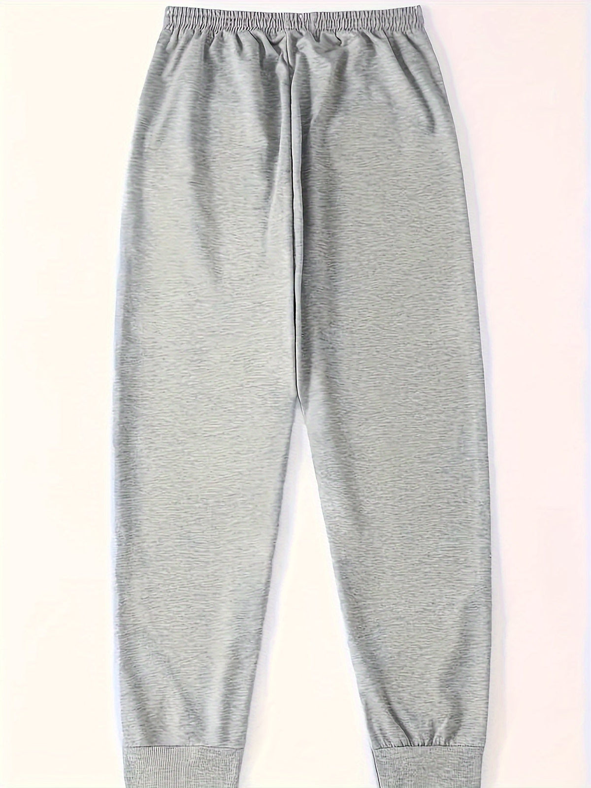 Kessoro unisex relaxed tapered drawstring joggers in black or grey with side pockets