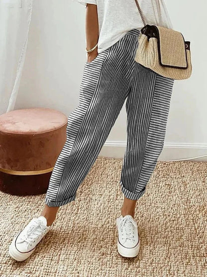 Women's relaxed striped lightweight summer trousers in six colourways, shown for womenswear styling
