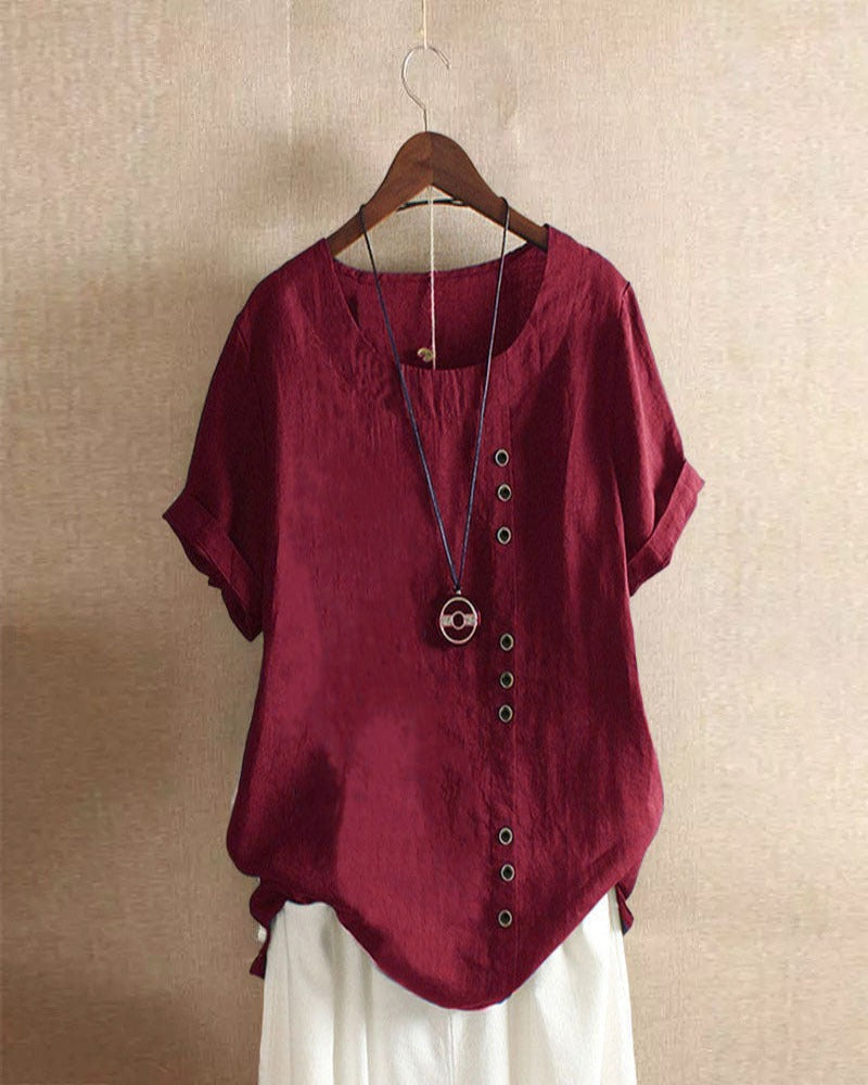 Women's asymmetrical button detail lightweight summer blouse in nine colourways, shown for womenswear styling
