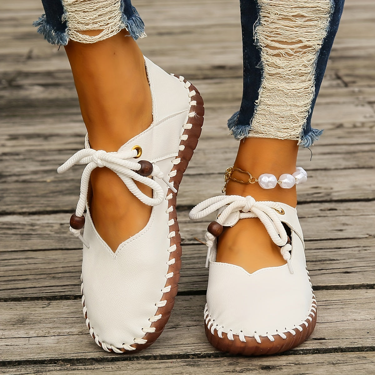 Kessoro Women's handcrafted cushioned lace-up flats in white and black, view 4