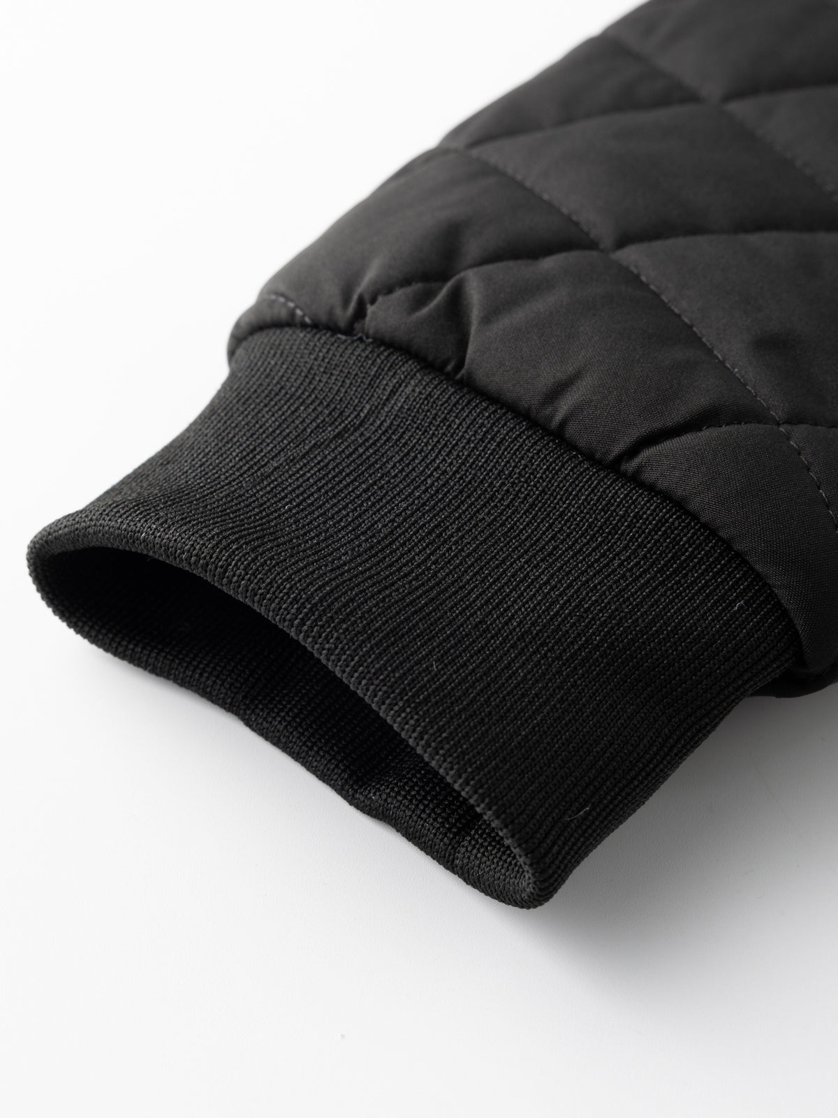 Kessoro unisex quilted bomber jacket in black with a full-length zip