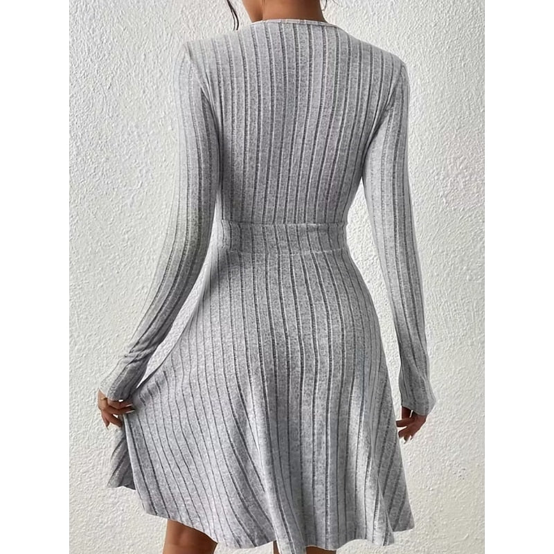 Kessoro women's wrap-neck A-line dress with a defined waist and softly flared skirt