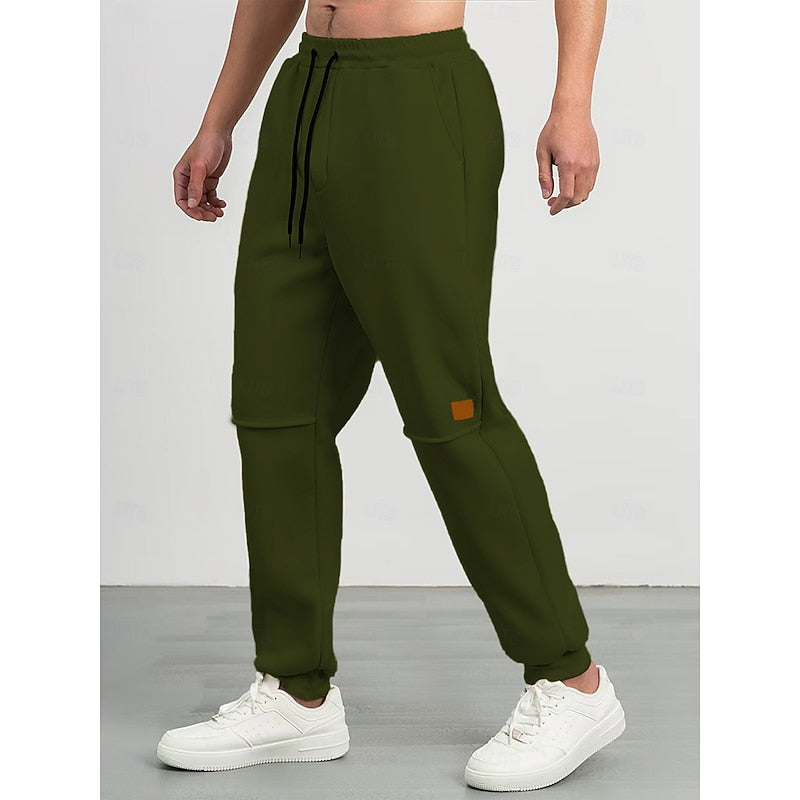 Kessoro unisex relaxed tapered drawstring joggers in apricot, green and blue