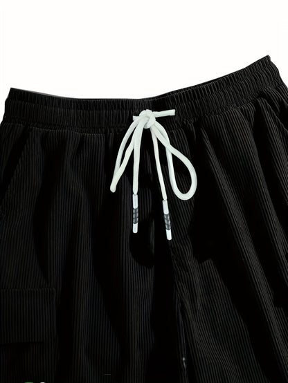 Men's textured drawstring cargo shorts in black, apricot and grey, view 9